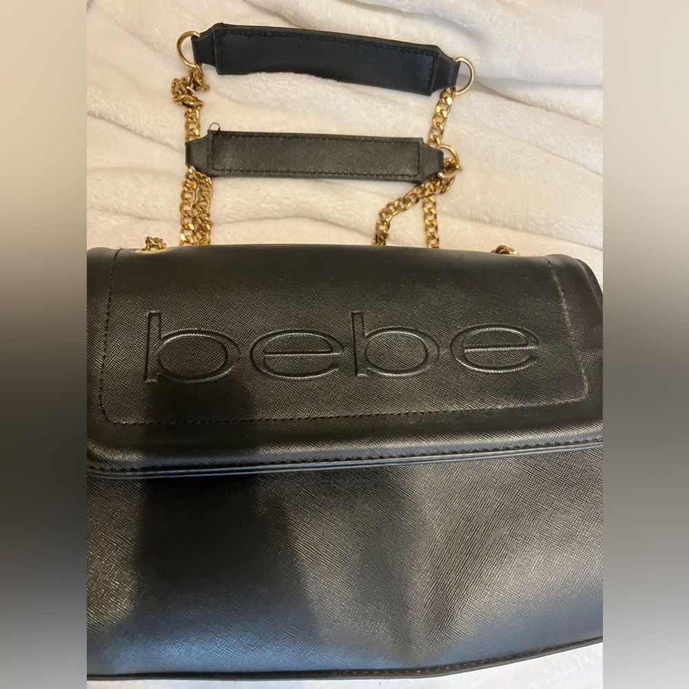 Bebe black and gold purse